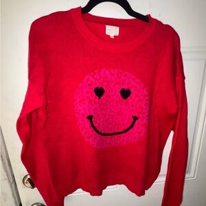 red and pink smiley face sweater by Dee Ell box AL